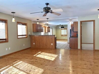 Kitchen, guest bedroom on right