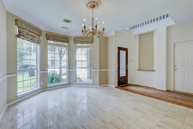 Spacious open dining room with marble floors