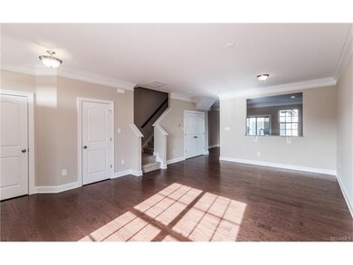 Family room with hardwood floors.
