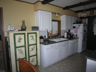 Great size kitchen has tons of storage.  Opening a