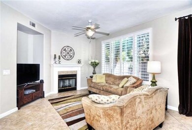 View from breakfast bar into family room with cozy