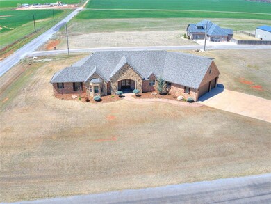 Birds eye view of property featuring a rural view