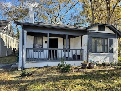 View of front of property featuring covered porch 
