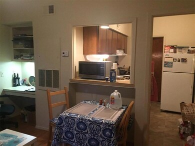 Kitchen with stainless steel microwave, freestand