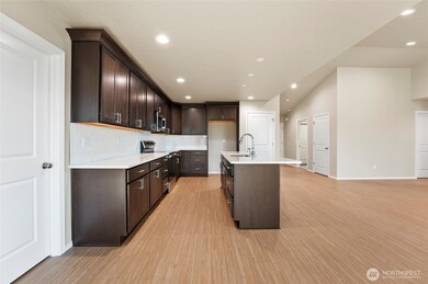 Photos are from a previously built home. Photo renderings may include upgrades/furnishings not included in base price.