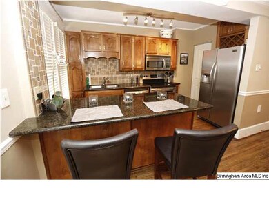 Kitchen has been completely updated with granite c
