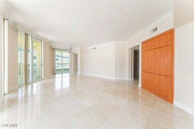 Spare room featuring expansive windows, ornamental