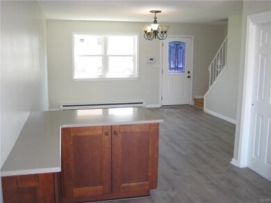 Close up of cabinetry and quartz countertops in th