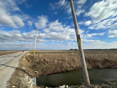 Standing on the South East Corner of E 21st Street