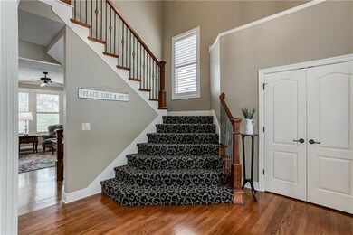 Spacious entry with easy access to THE upstairs, T