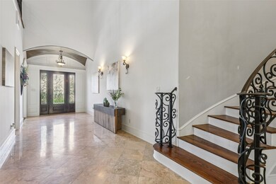 Hallway with vaulted ceiling