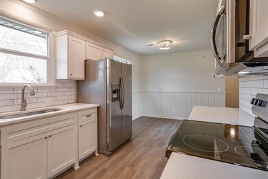 New kitchen with self-closing cabinet doors and drawers.  Garbage disposal, microwave, overn , range, dishwasher.  Fridge has water and ice in the front door.