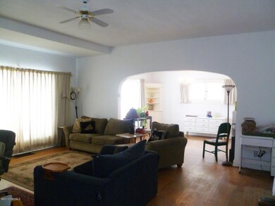 Spacious Living Room with Hardwood Floor