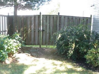 Gate at side of house to back yard.