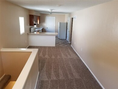 Upstairs living room (view from steps) (unit 232)