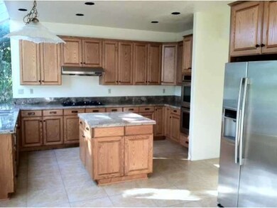 Remodeled kitchen with granite counters and all ap