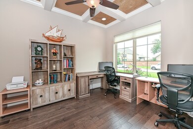 Private Study with 8 foot Glass French Doors and Coffered Ceiling