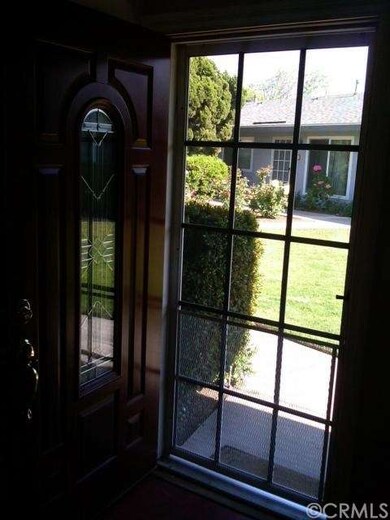 VIEW LOOKING OUT FRONT DOOR