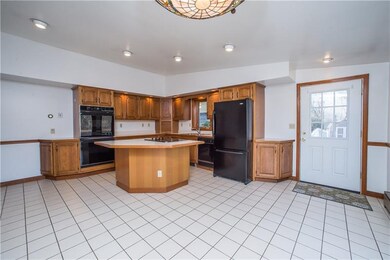 Spacious 18x15 eat-in kitchen will be the heart of