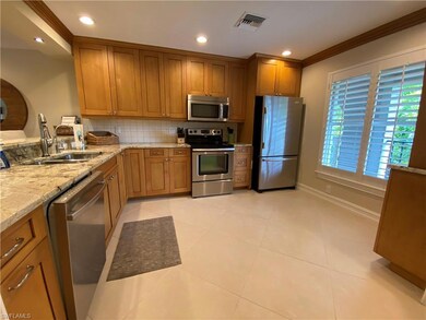 9101 Vanderbilt Dr unit 304, Naples, FL 34108 - photo 3