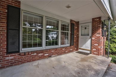 Spacious covered front porch to relax on