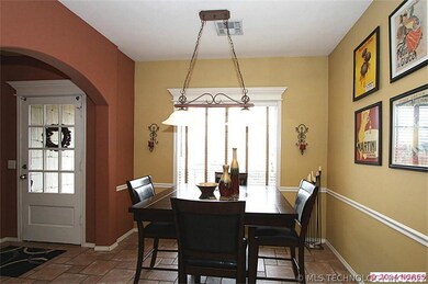 To the left of the entry is the kitchen nook with