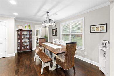 A large dining space is flooded with natural light