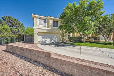 View of front of home with concrete driveway, an a