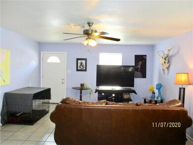 Spacious Living Room.  Ceramic Tile throughout.
