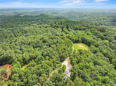 Aerial view of a heavily wooded area
