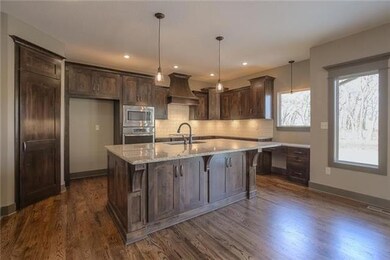 Custom cabinets. Over sized kitchen island with gr