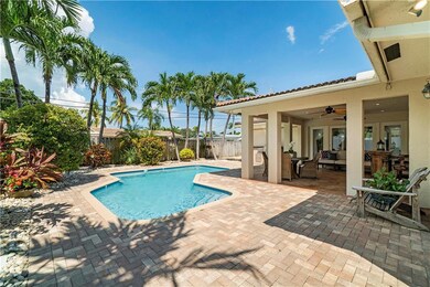 Tropical Back Yard with Pool and Covered Patio