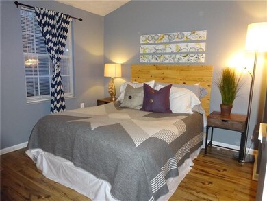Master Bedroom with Hickory Laminate Floors, Cathe