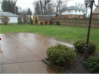 Yard/Garden Shed/partially fenced yard nicely land