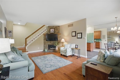 Living Room has gun stock hardwood floors