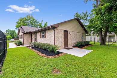 Side view of home with full yard visibility and gr