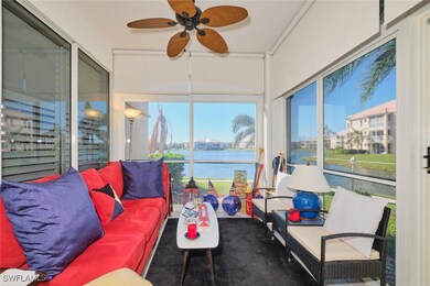 Sunroom / solarium featuring a water view and ceil