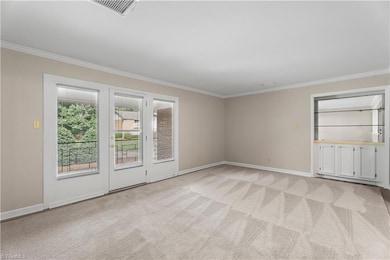 Condo C is Top Left with Screening on Balcony Railing.