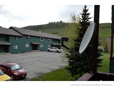 Exterior Front. The parking is reserved for one ca