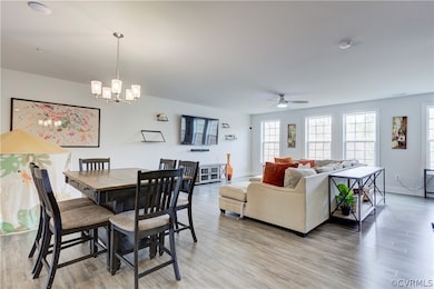 Dining room with light hardwood / wood-style floor