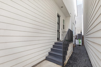Front door on the side with easy access into the h