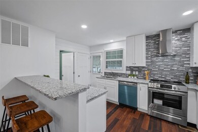 Kitchen has wood flooring, 42