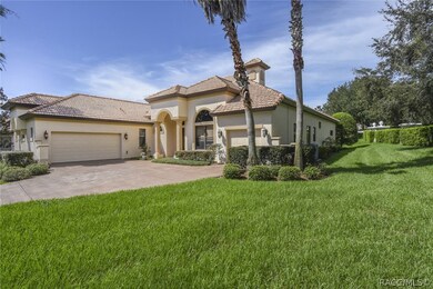 Separate attached garages: 2 car to left and golf