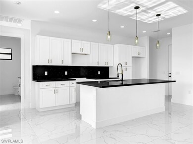 718 Downer Ave S, Lehigh Acres, FL 33974 - photo 3