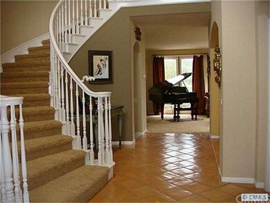 Expansively dramatic foyer.