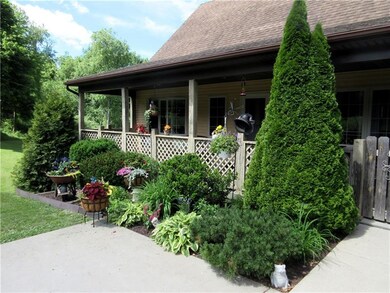 Enjoy the fresh, country air on the 36x8' covered 