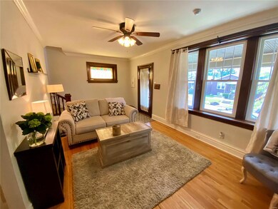 Large family room looking at front door from dinni