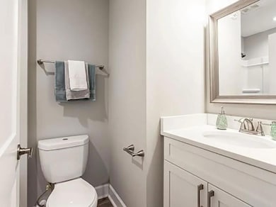 Bathroom with toilet and vanity