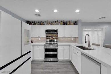Kitchen featuring a sink, stainless steel applianc