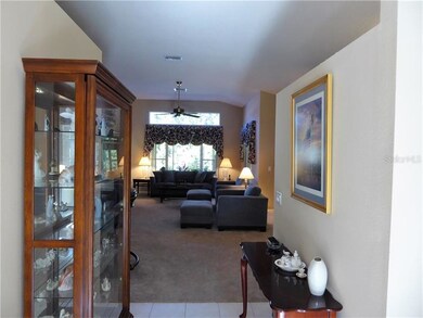 FOYER FEATURES SOARING CEILINGS AND PLANT SHELVE